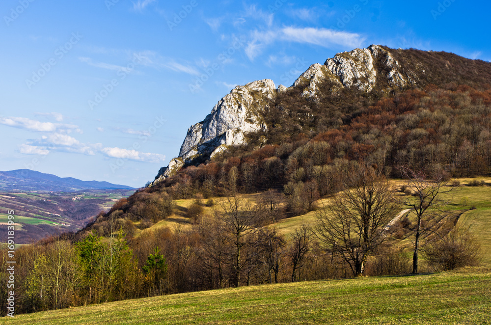 Meadows and hills, Homolje mountains landscape on a sunny day in early spring, east Serbia Meadows and hills, Homolje mountains landscape on a sunny day in early spring, east Serbia