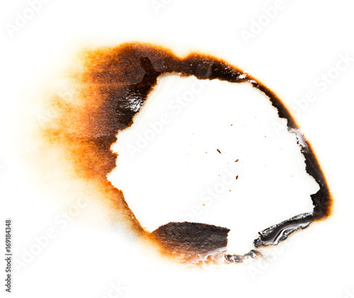 Trail of burnt paper on white background