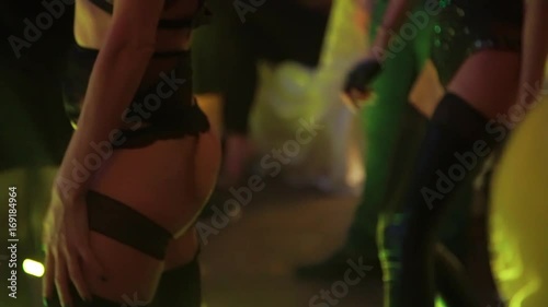 Very sexy girls dancing go-go in a nightclub. Slim and athletic build