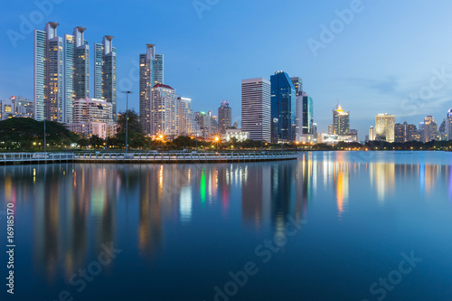 Twilight water reflection city office building, cityscape downtown © pranodhm