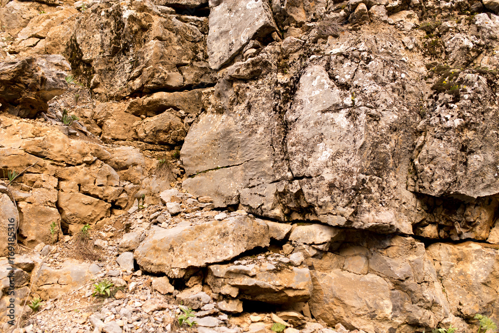 Stone cliffs in the mountains as a background Stone cliffs in the mountains as a background