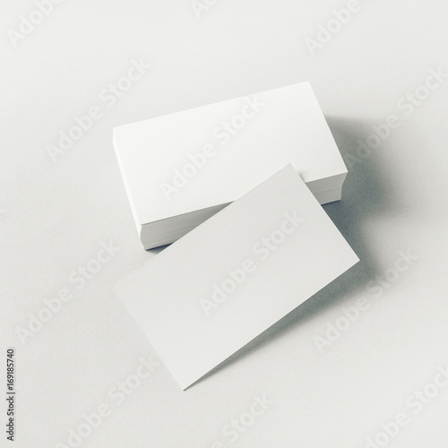 Photo of blank business cards on paper background. Mockup for ID.