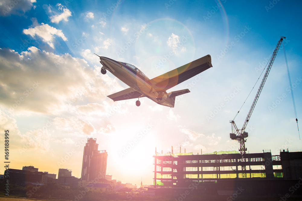 The aircraft was flying in the sky and building of a large building depended on the growth of the city and the logistical system