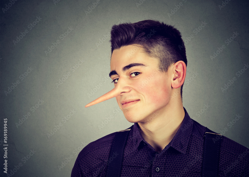 Liar funny looking young sly man Stock Photo | Adobe Stock Liar funny looking young sly man Stock Photo | Adobe Stock