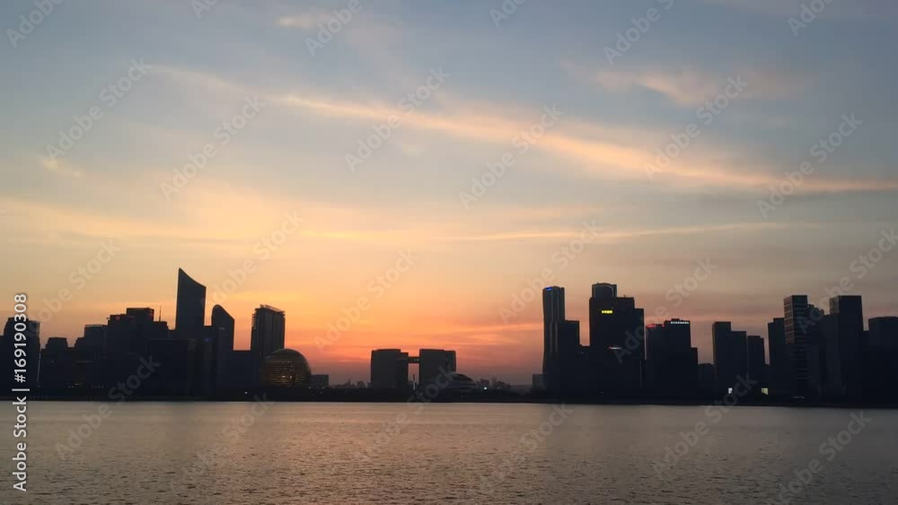 modern buildings in hangzhou qianjiang new city at sunset from bank modern buildings in hangzhou qianjiang new city at sunset from bank
