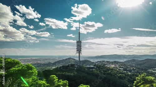 Timelapse of Torre de Collserola from Tibidabo mountain, Barcelona, Spain. photo