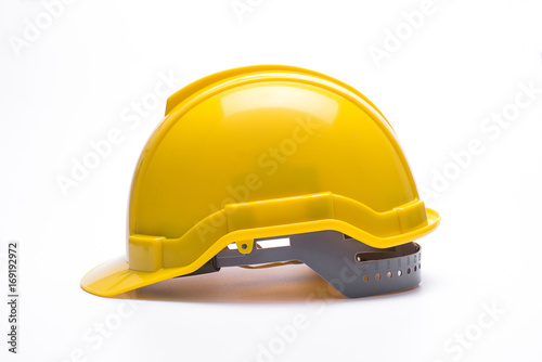 Yellow safety helmet isolated on white background. photo