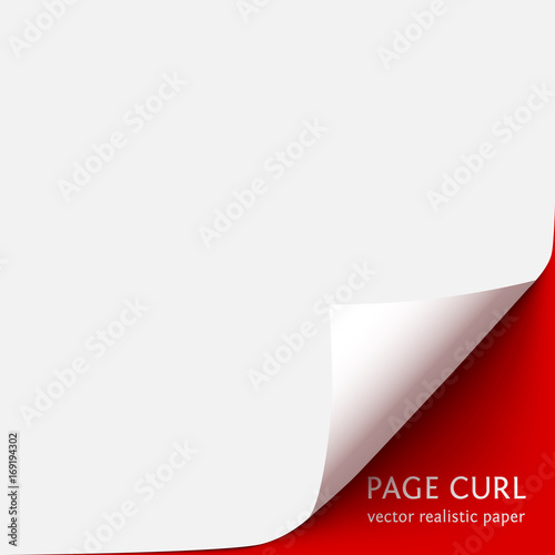 Curled corner of paper with shadow on red background