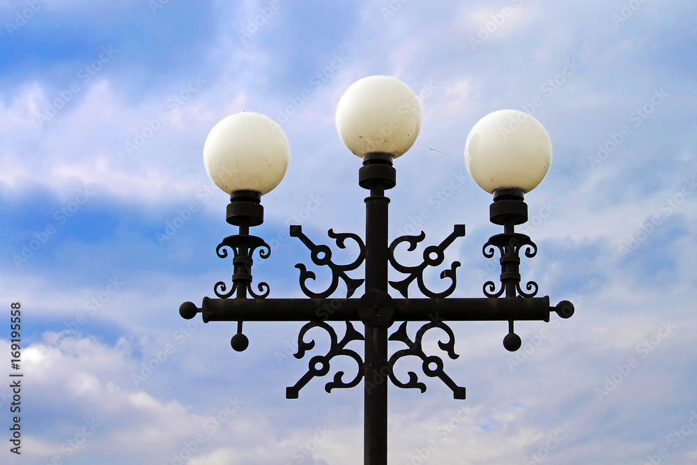 Street lamp against blue sky in Chernihiv, Ukraine Street lamp against blue sky in Chernihiv, Ukraine