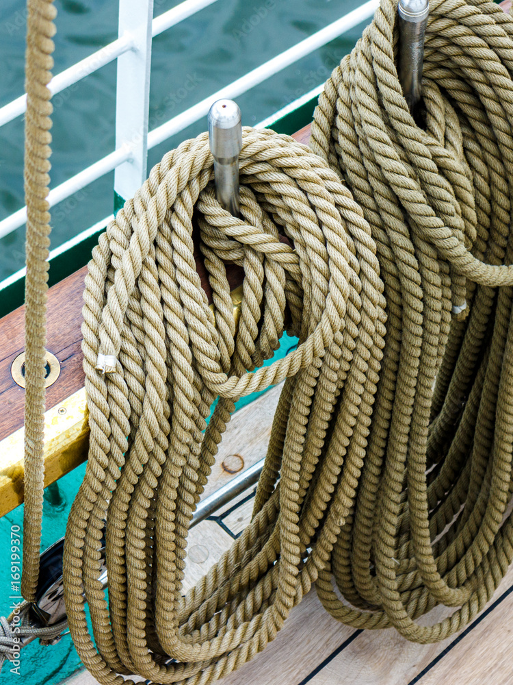 Old fashioned harbor marina sailboat ropes