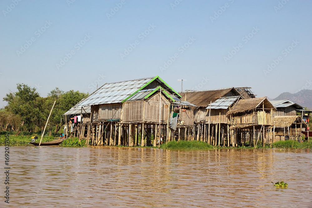 Village with traditional wooden stilt houses on the Lake Inle Myanmar Village with traditional wooden stilt houses on the Lake Inle Myanmar