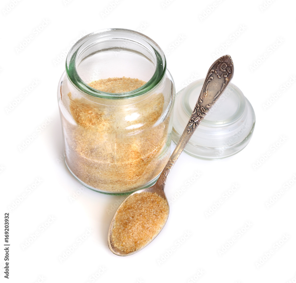 Gelatin or gelatine in the glass jar. On white background. Gelatin or gelatine in the glass jar. On white background.