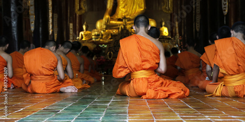 monks praying in temple,chiang mai , Thailand