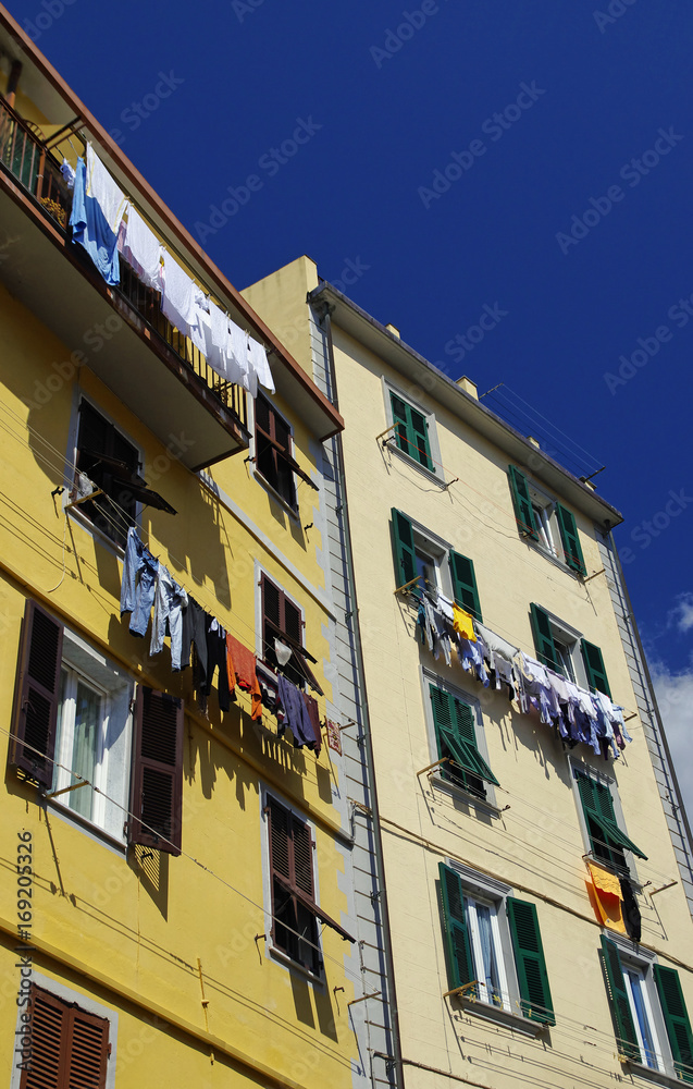 Riomaggiore, Italy - April 14, 2017 : A colorful houses in Riomaggiore on April 14, 2017. Riomaggiore is one of the five famous Cinque Terre villages