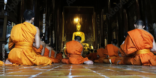 Photography monks praying in temple,chiang mai , Thailand