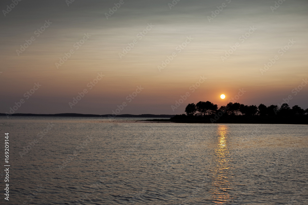 Naklejka premium Sunset over the sea