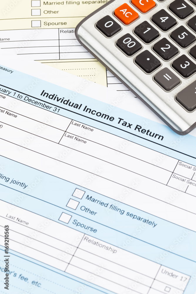 Tax form and calculator; document are mock-up Tax form and calculator; document are mock-up