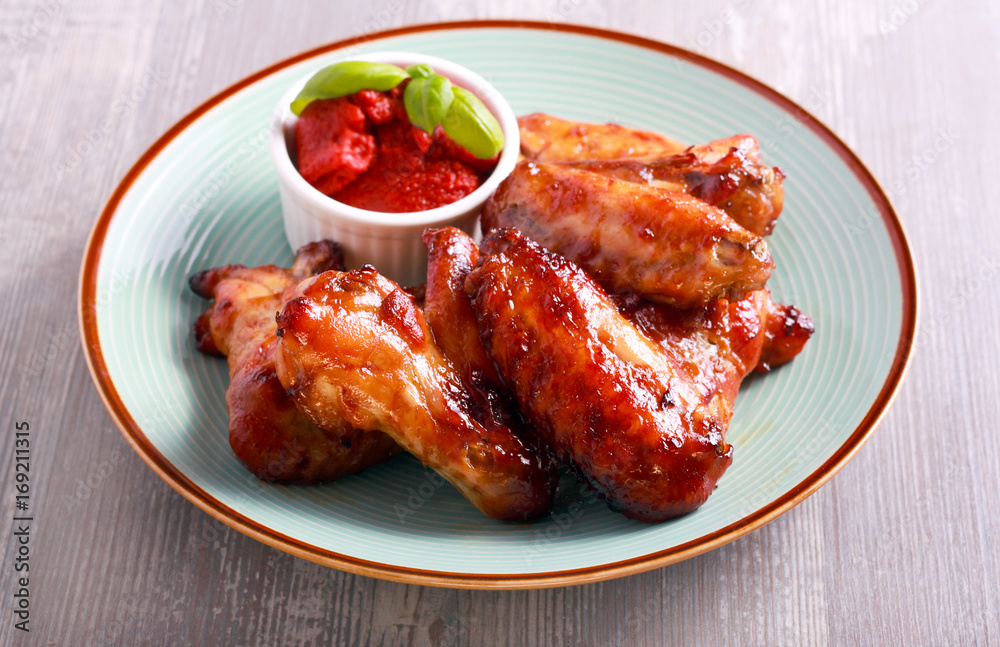 Roast chicken wings and tomato sauce Roast chicken wings and tomato sauce