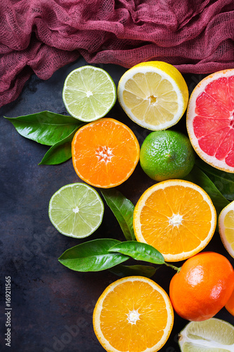 Citrus fruits background. Orange, grapefruit, tangerine, lime, lemon vitamin