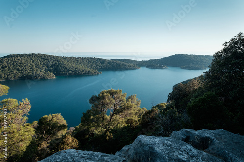 Nice hike view of a lake, ocean and islands at Mljet island, Croatia Europe © AdamDobias