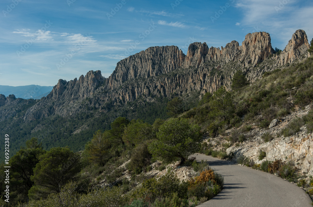 Road across Castellets Ridge near Puig Campana, from near Altea / Benidorm, Spain. Road across Castellets Ridge near Puig Campana, from near Altea / Benidorm, Spain.