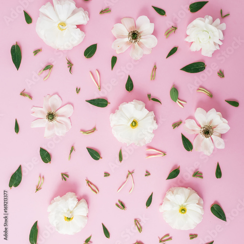 Pattern of white flowers on pink background. Flat lay, top view. Flowers background.