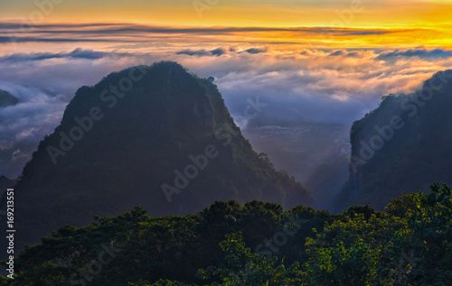 Doi pha mee national park covered by morning fog and sunrise at Phamee, Maesai, Chiang rai, Thailand.
