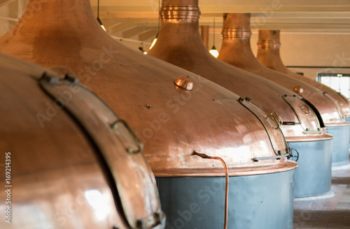 Pilsen, Czech Republic - August 16, 2017: Huge copper tin for baking in the Pilsel Urquell beer factory photo