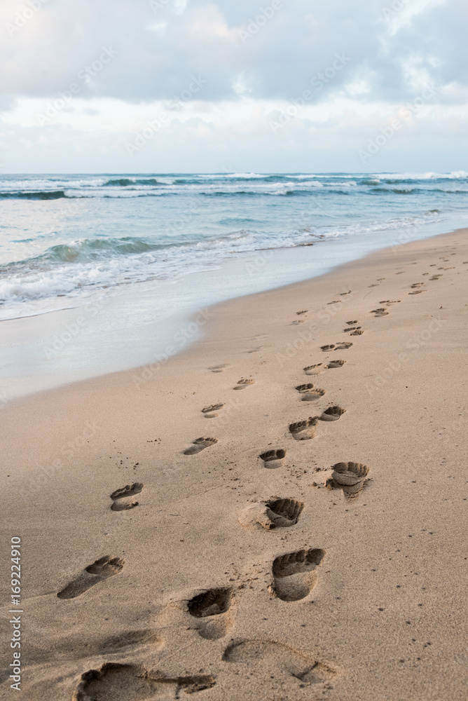 Footsteps along beach in Hawaii Footsteps along beach in Hawaii