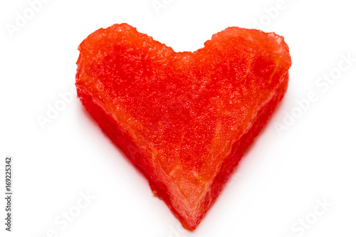 heart-shaped piece of watermelon on white background