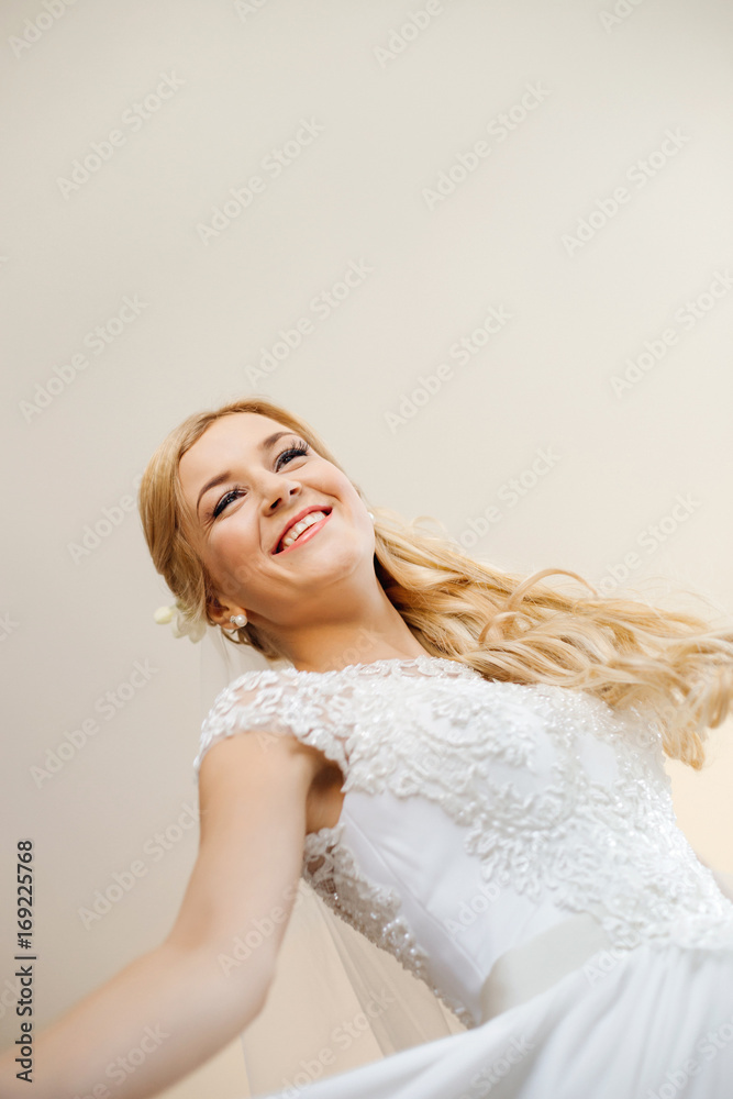 Cheerful young bride on the happiest day of her life Cheerful young bride on the happiest day of her life