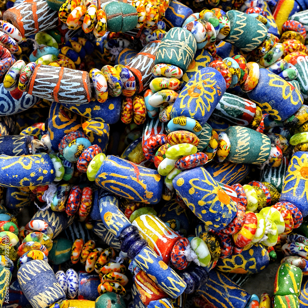 Local craft market in Africa. Unique handmade colorful beads bracelets, bangles. Craftsmanship. African fashion. Traditional ornament, accessories.