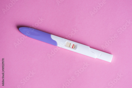 Negative pregnancy test on pink background  © emilijamanevska