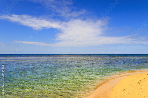 Summer seascape, Apulia coast: Salento beach.It's characterized by a alternation of sandy coves and jagged cliffs overlooking a truly clear and crystalline sea.