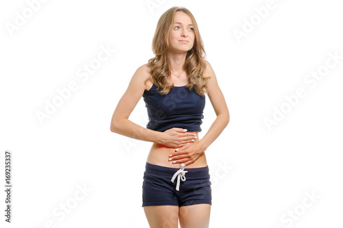 Young woman with abdominal pain © Kabardins photo