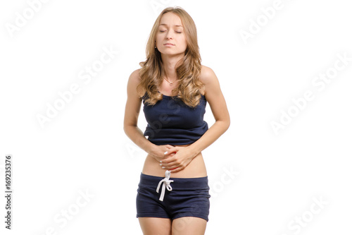 Young woman with abdominal pain © Kabardins photo