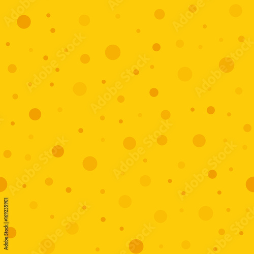 Orange polka dots seamless pattern on yellow background. Attractive classic orange polka dots textile pattern in restrained colours. Seamless scattered confetti fall chaotic decor.
