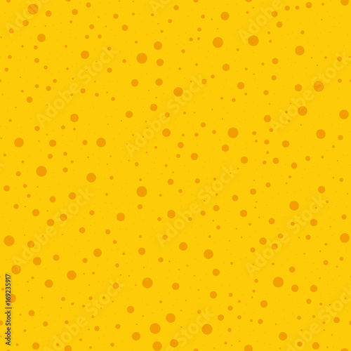 Orange polka dots seamless pattern on yellow background. Wondrous classic orange polka dots textile pattern in restrained colours. Seamless scattered confetti fall chaotic decor. Vector illustration.