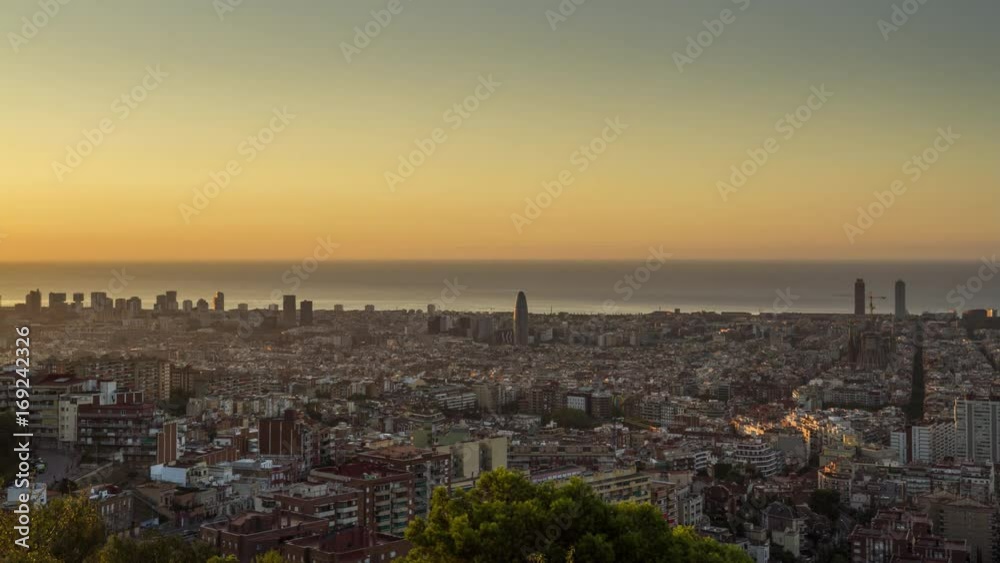 Timelapse (time lapse, time-lapse): morning sun over Barcelona cityscape, Spain. August 2017. Timelapse (time lapse, time-lapse): morning sun over Barcelona cityscape, Spain. August 2017.