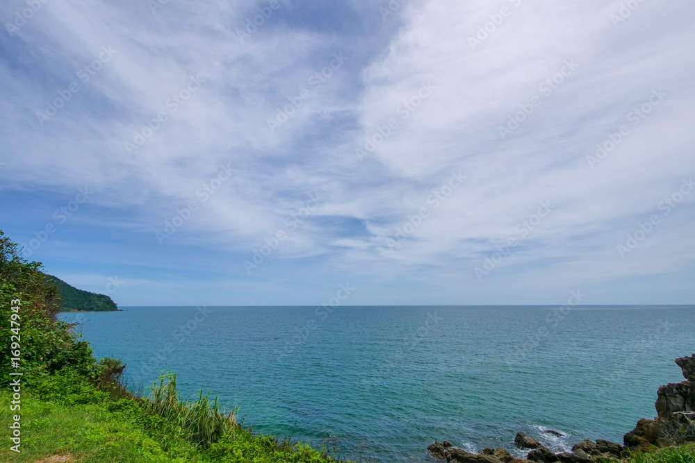 The mountains and sea scenery with blue sky The mountains and sea scenery with blue sky