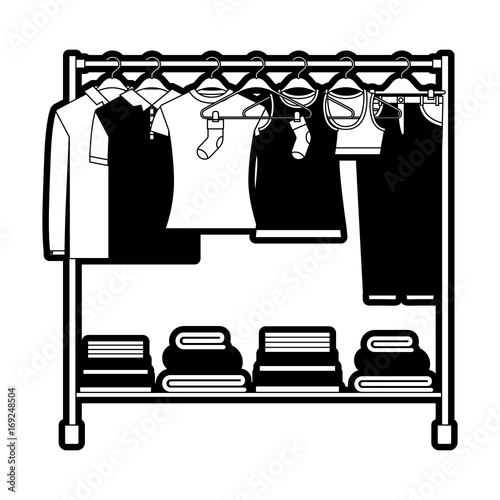 black sections silhouette of clothes rack with t-shirts and pants on hangers and fold clothes on bottom