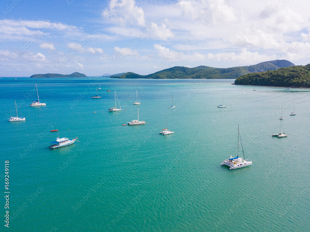 Aerial view or top view of tropical island with boat, Phuket island