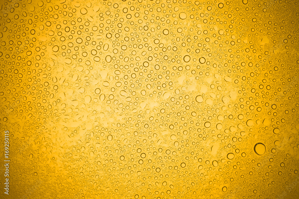Water drops on yellow glass, Rain droplets on glass background. Water drops on yellow glass, Rain droplets on glass background.
