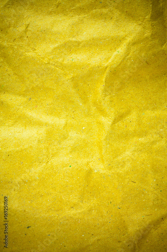 Yellow vignette crumpled paper.