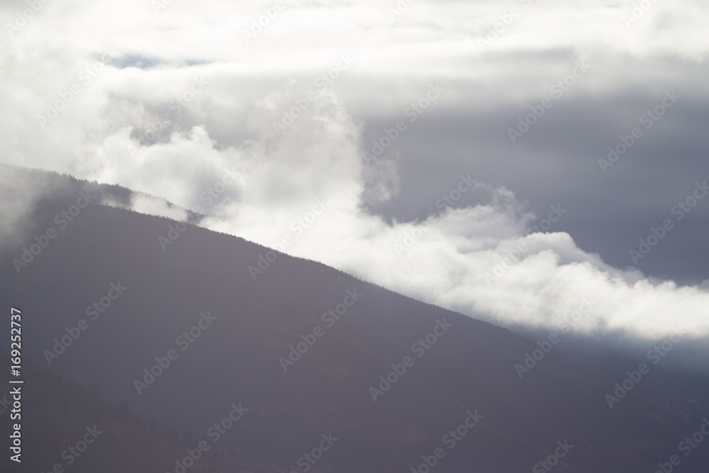 Top of a cloudy mountain during fall in Colorado