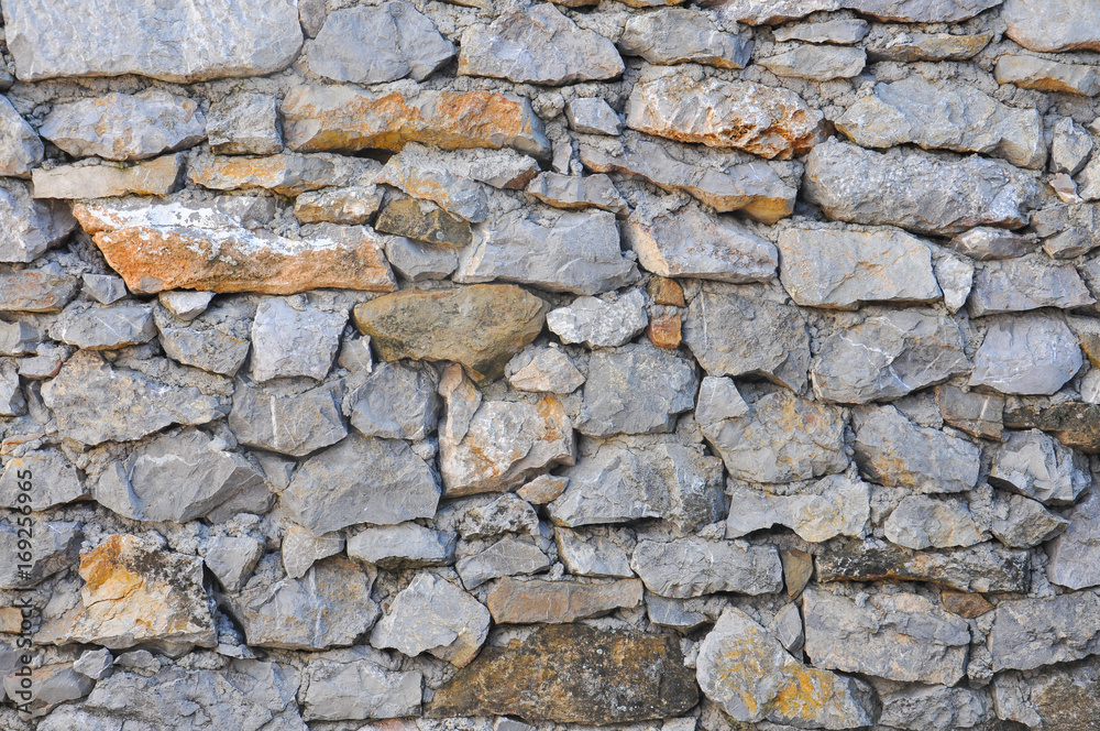 Fototapeta premium Old stone wall texture. Retro wall background