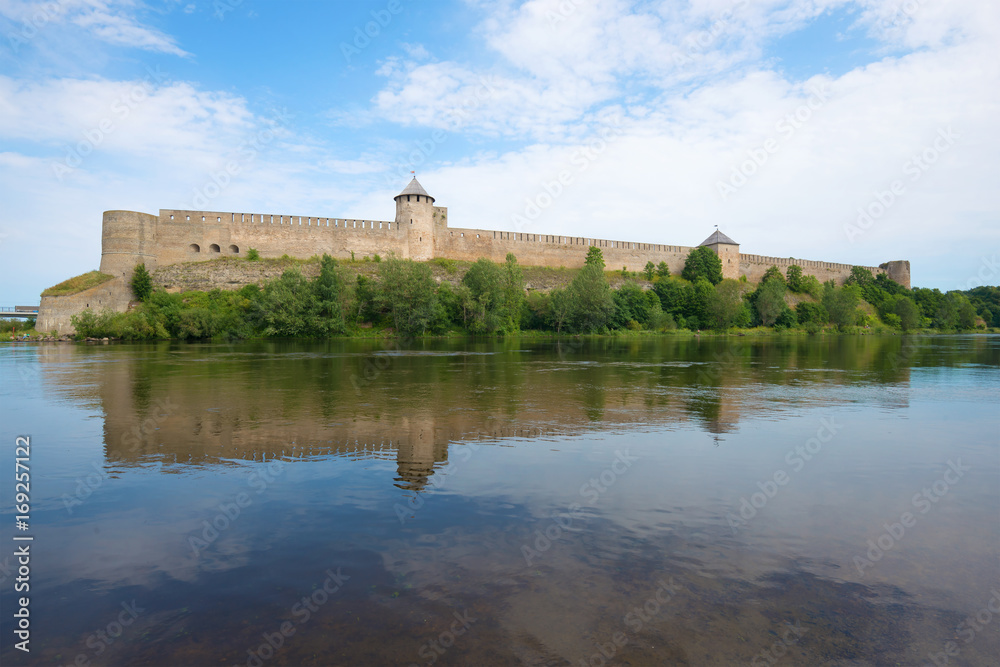 Ivangorod fortress on the Narva river on a cloudy August day. Russia
