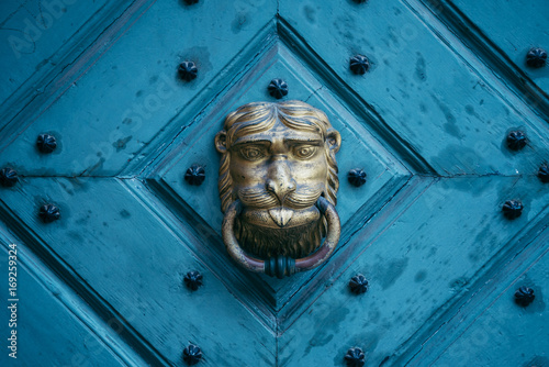 an old metal door handle knocker