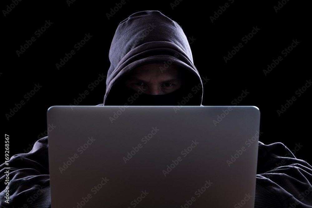 Anonymous hacker in the dark Anonymous hacker in the dark