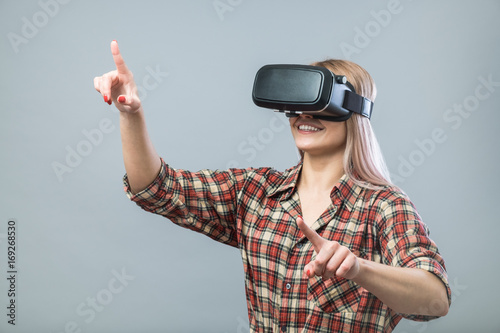 Cheerful woman with vr headset